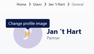 The top of a user's page, with the breadcrumb Home, Users, Jan 't Hart, General. The user's initials avatar sits beside their name and role, with an edit icon over the avatar and a tooltip reading Change profile image.